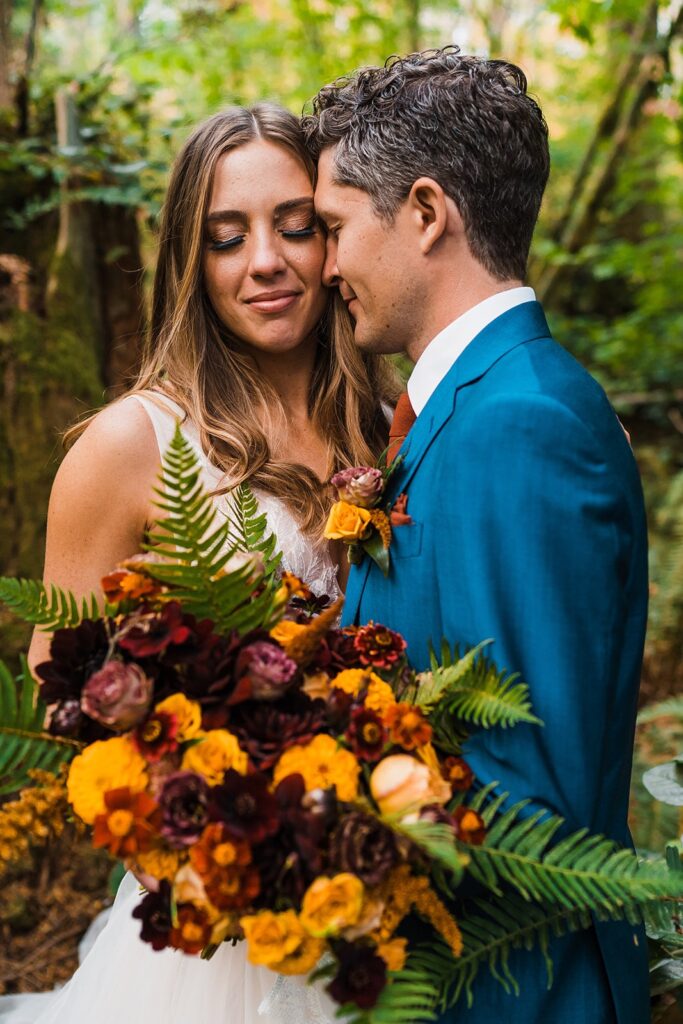 Bride and groom portraits in the forest at Washington elopement in Snoqualmie Pass