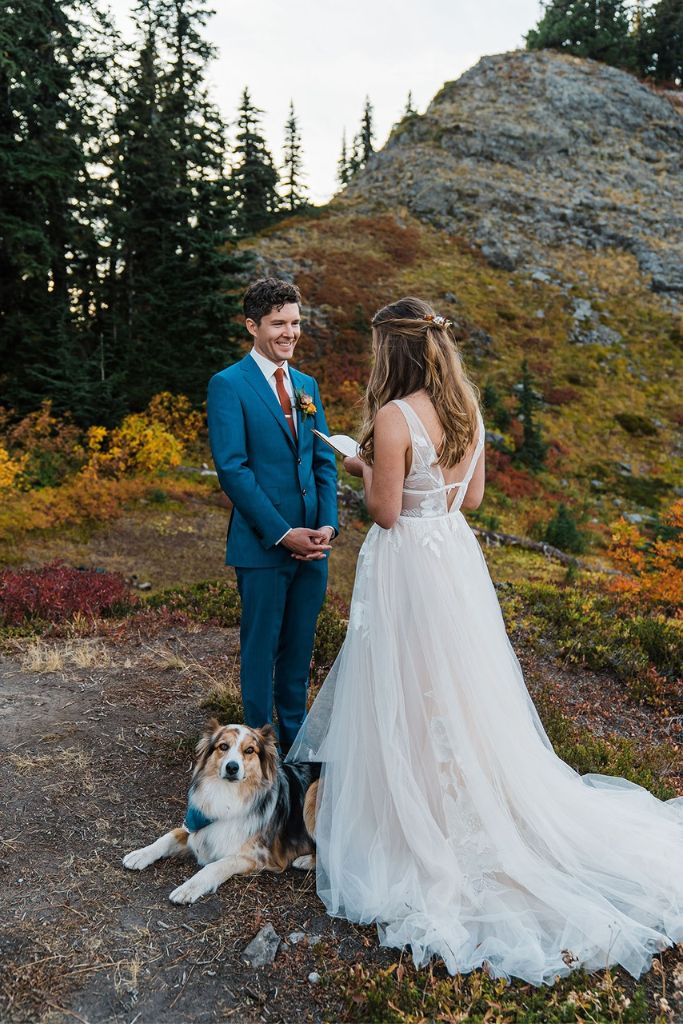 Bride and groom exchange vows during their Washington elopement in Snoqualmie Pass