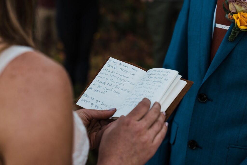 Bride reading vows to groom during Snoqualmie Pass elopement in the mountains