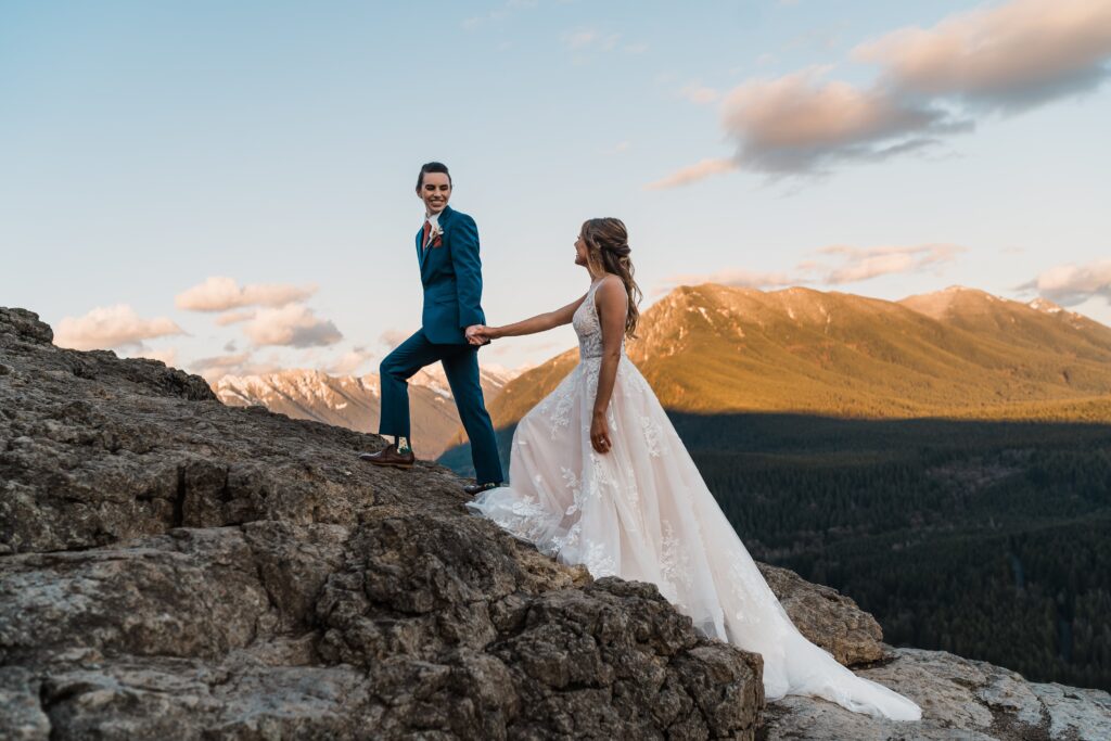 Brides climb up a mountain for their adventure wedding in Snoqualmie 
