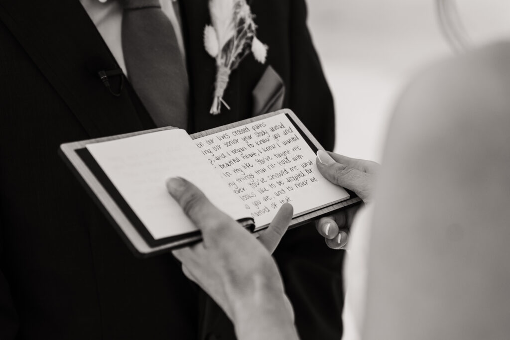 Handwritten vows in wood vow book