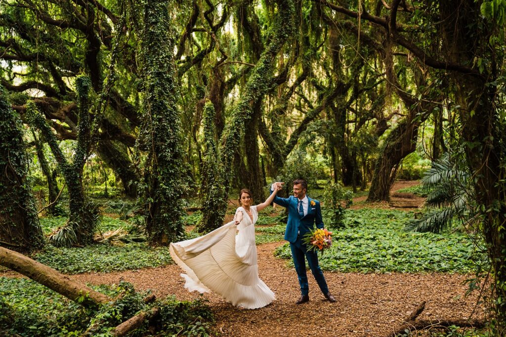 Bride and groom dance in the rainforest at their Hawaii elopement