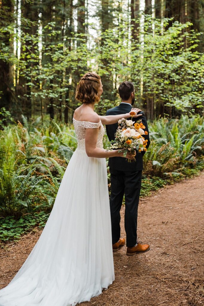 Bride and groom first look in the redwoods at Jedediah Smith Redwoods State Park
