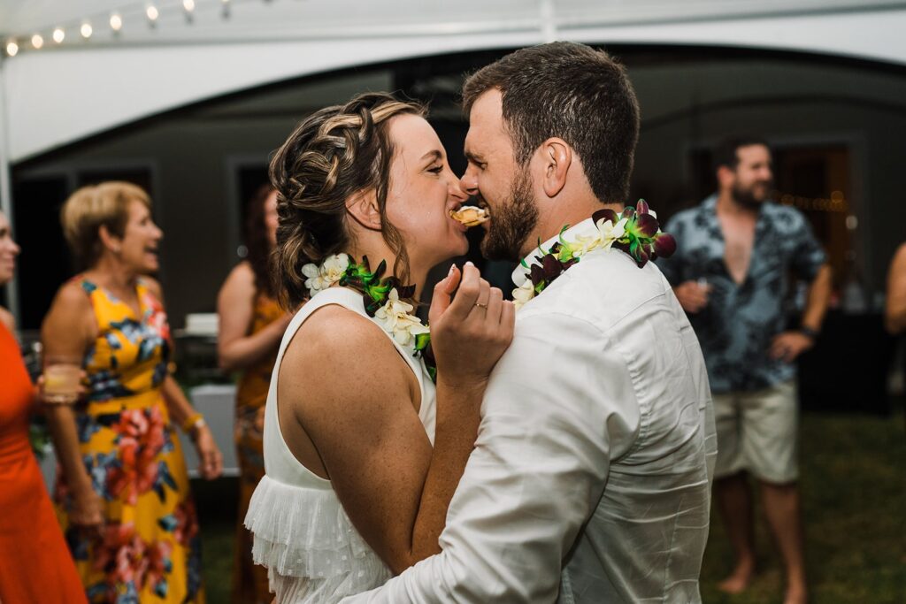 Bride and groom make a face at their dance party in Kauai