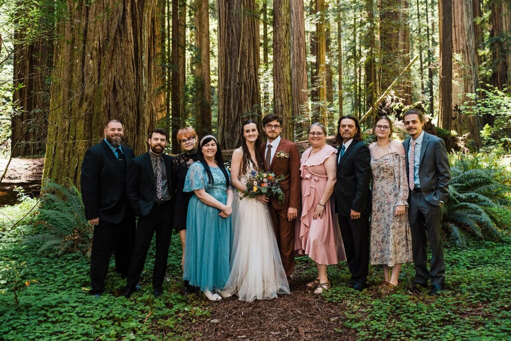 Bride and groom redwoods elopement photos with family on the Oregon Coast