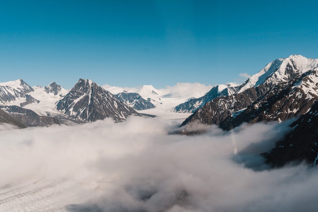 Snow-capped mountains during helicopter elopement flights