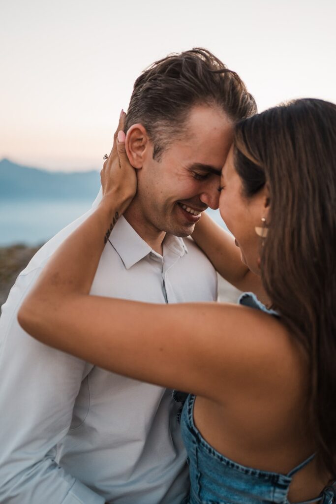 Bride and groom hug during sunrise elopement photos at Artist Point