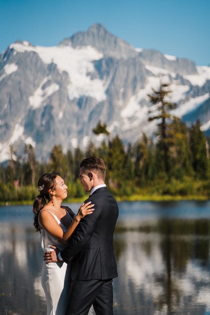 Bride and groom elopement photos at an alpine lake in the North Cascades