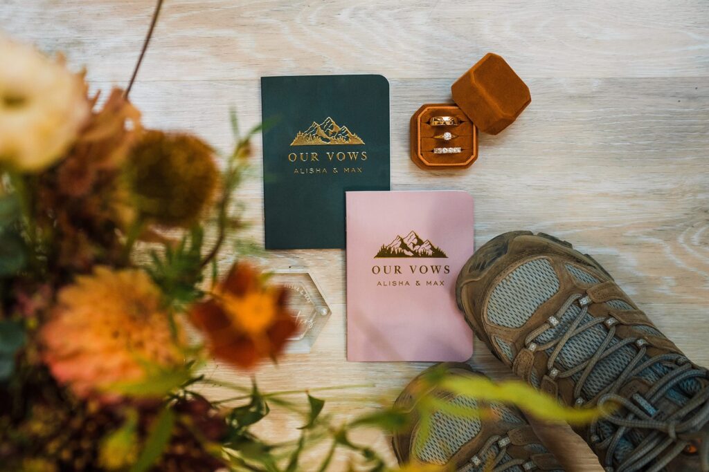 Pink and green vow books for family elopement in the North Cascades