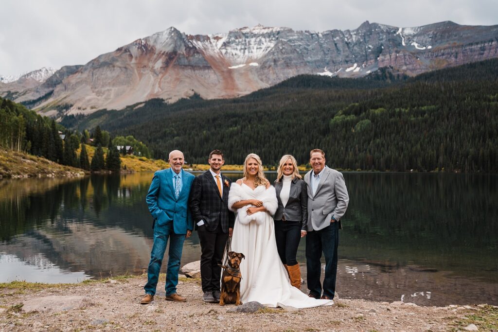 Wedding portraits with guests at Telluride elopement by an alpine lake