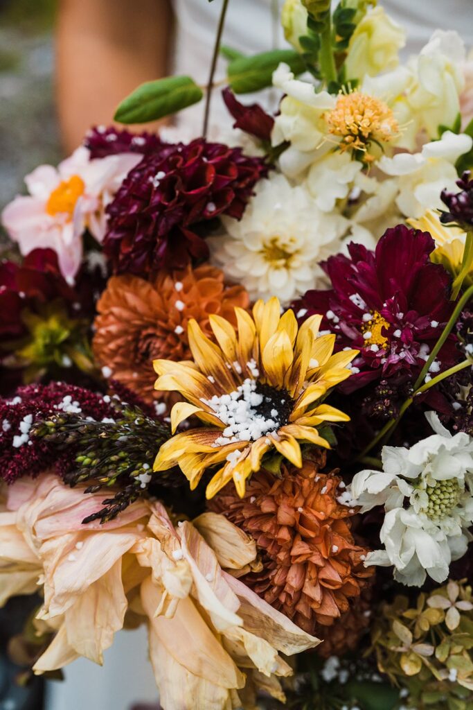 Fall elopement flowers with snow 