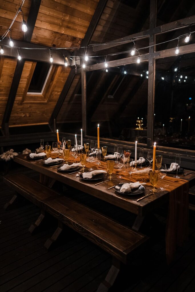 Candlelit reception table at Airbnb wedding cabin in Snoqualmie, Washington