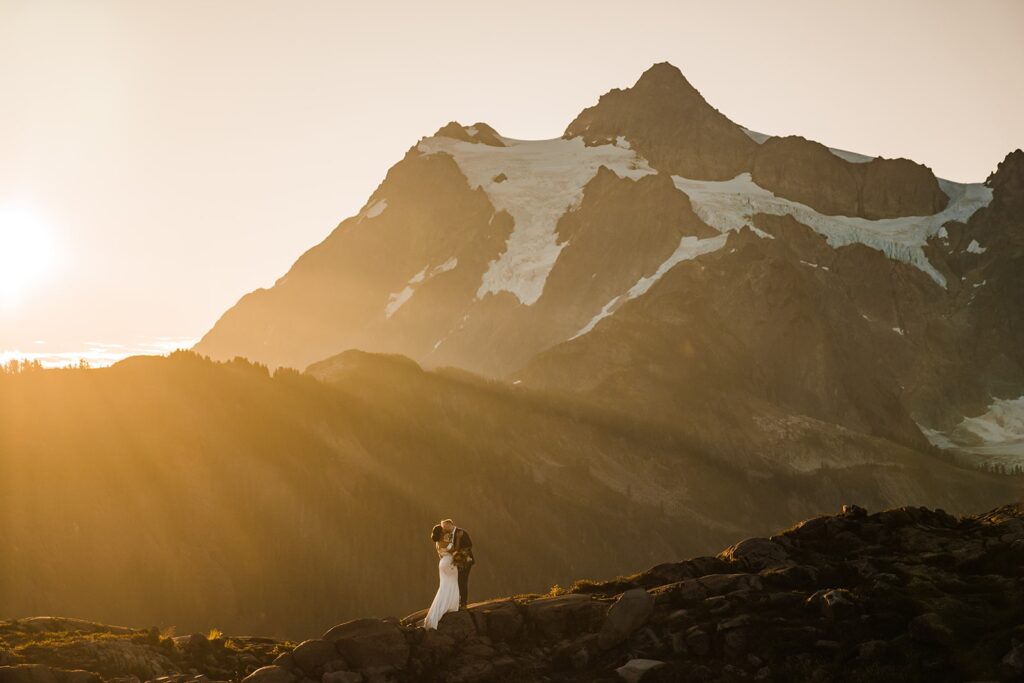 Bride and groom kiss in the mountains during their North Cascades National Park elopement