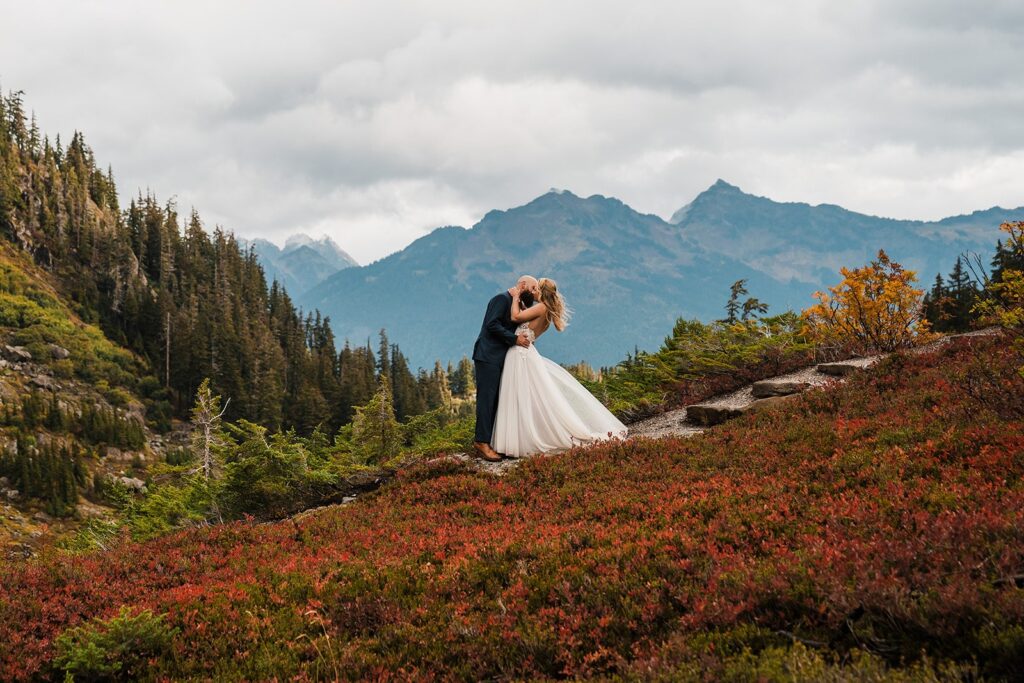 Bride and groom kiss in the mountains during their North Cascades elopement