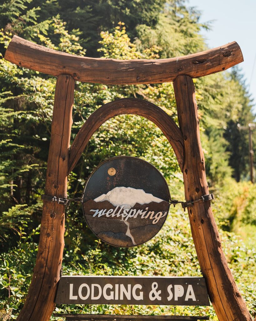 Entrance sign for Wellspring Lodge and Spa micro wedding venue