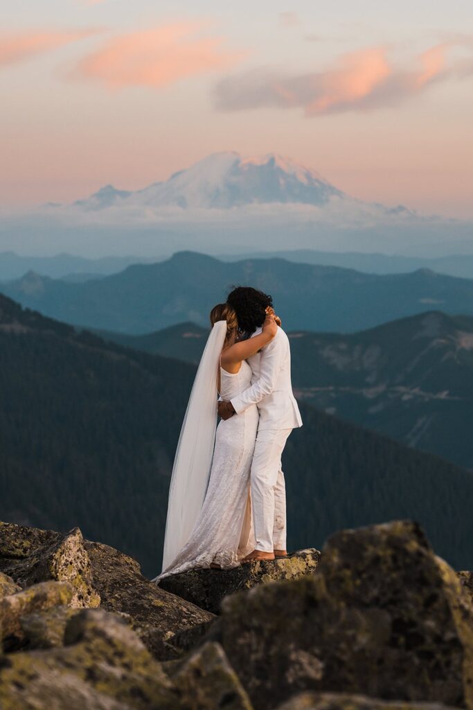 Bride and groom hug during their elopement in Snoqualmie