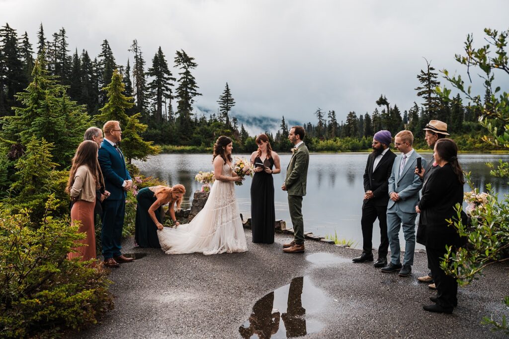 Rainy wedding ceremony by a lake in the North Cascades