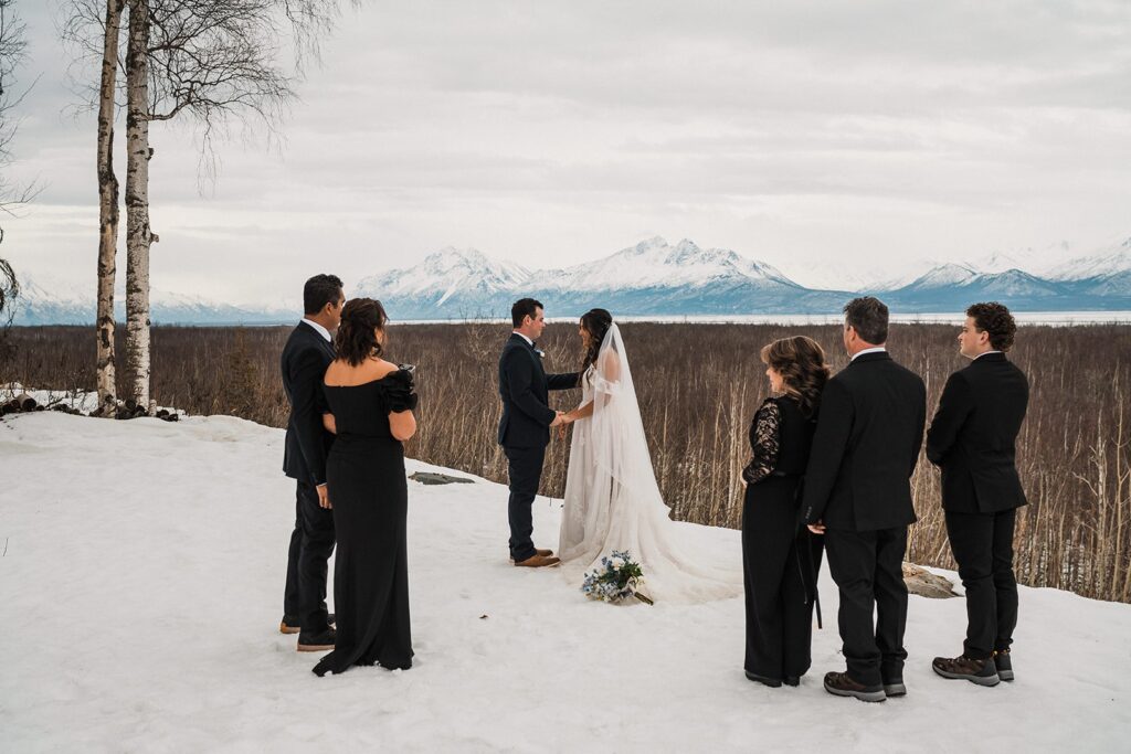 Outdoor wedding ceremony in the snow in Alaksa