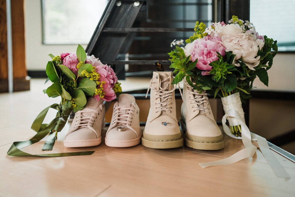 Cream hiking boots with pink and white flower bouquets