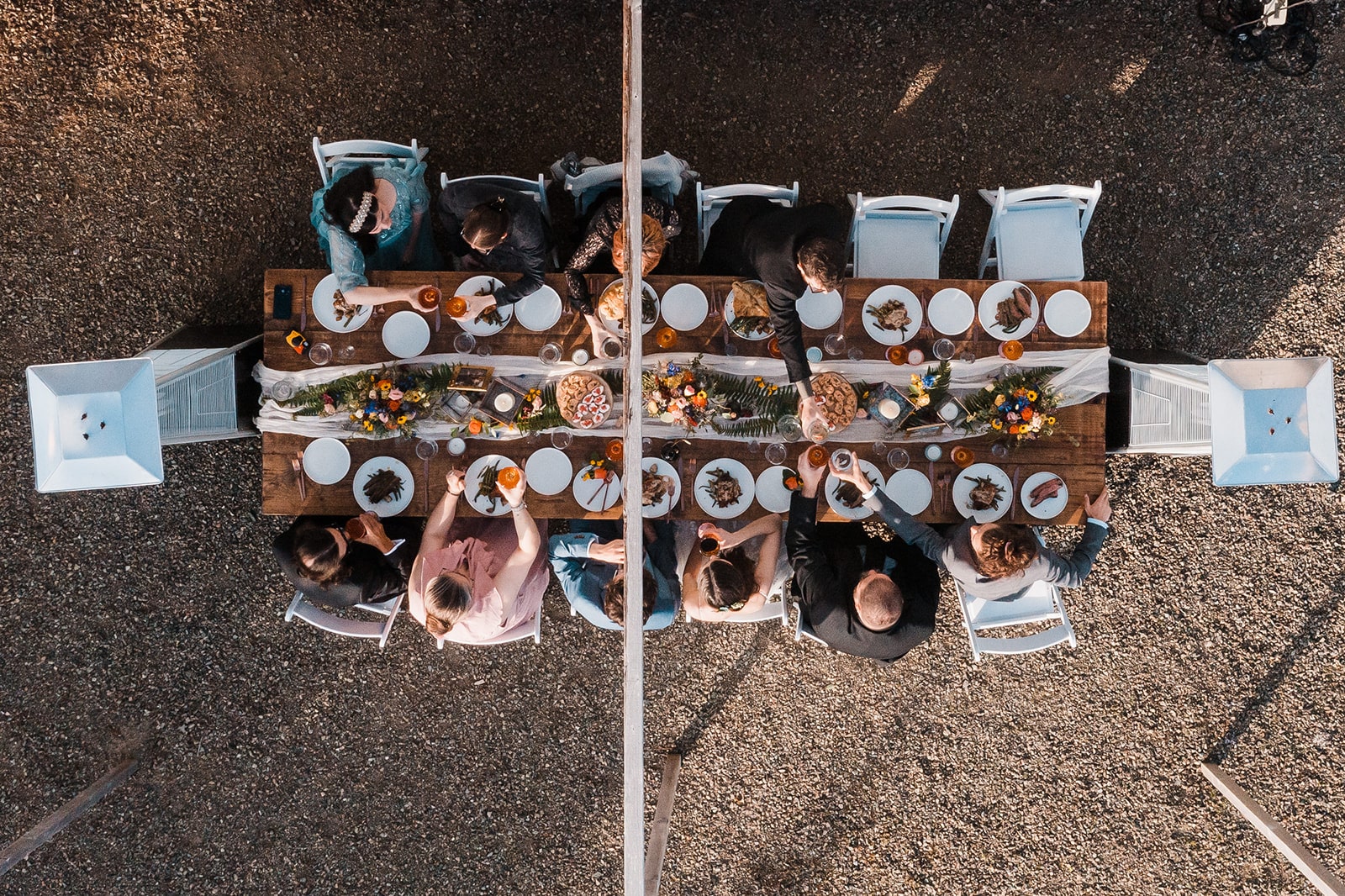 Guests enjoy an outdoor wedding reception meal at Crook Point, a micro wedding venue in Oregon