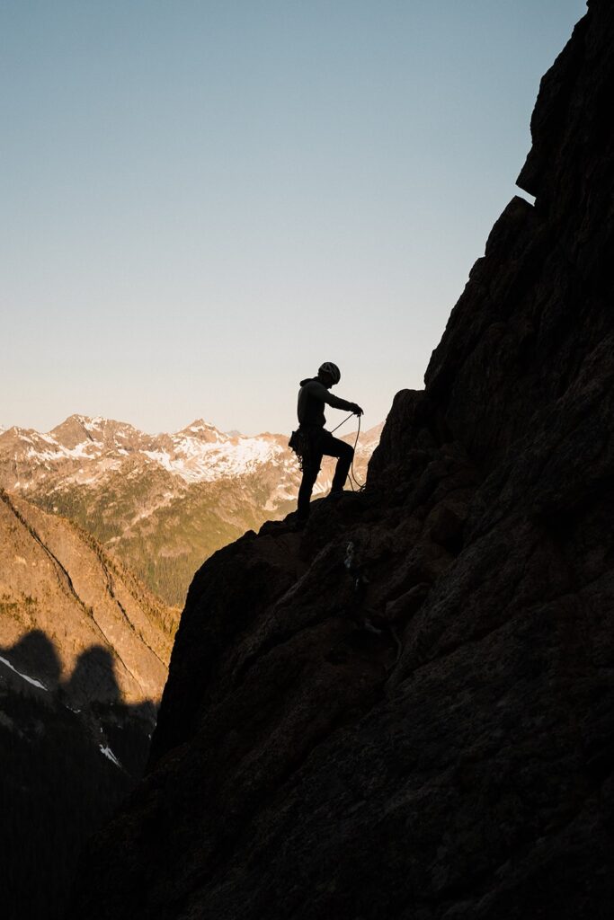 Rock climbers scaling a peak in the North Cascades