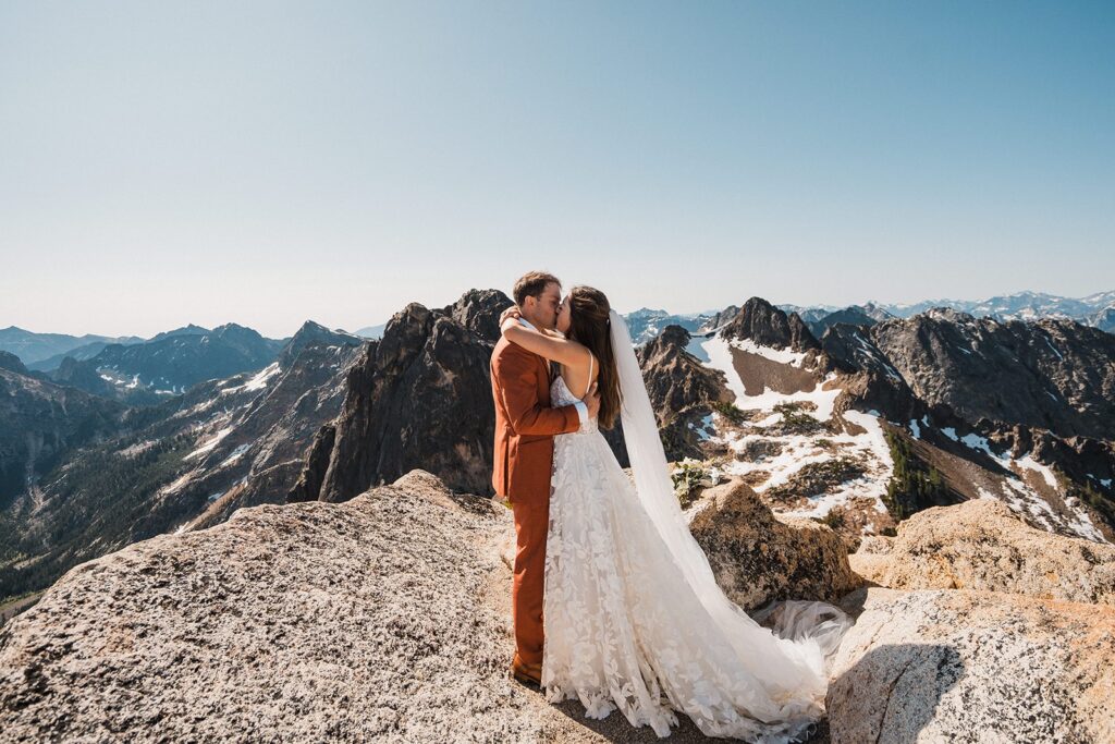 Bride and groom kiss after reading private vows in the North Cascades