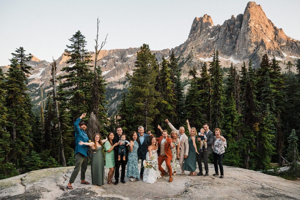 Guests cheer with bride and groom after their elopement ceremony in the North Cascades