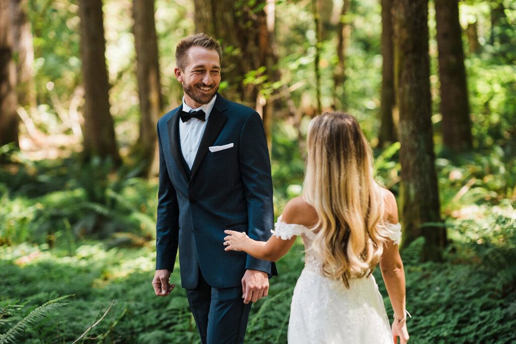 Groom turns around for elopement first look with bride