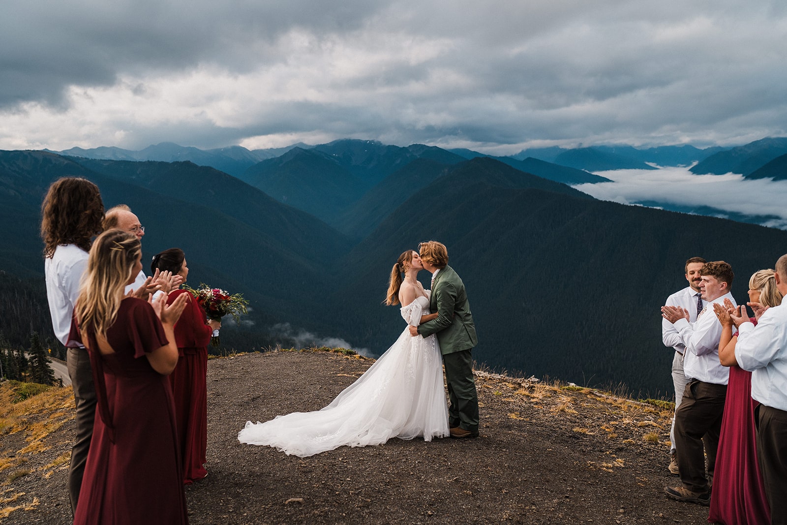 Bride and groom kiss during their national park elopement ceremony at Hurricane Ridge