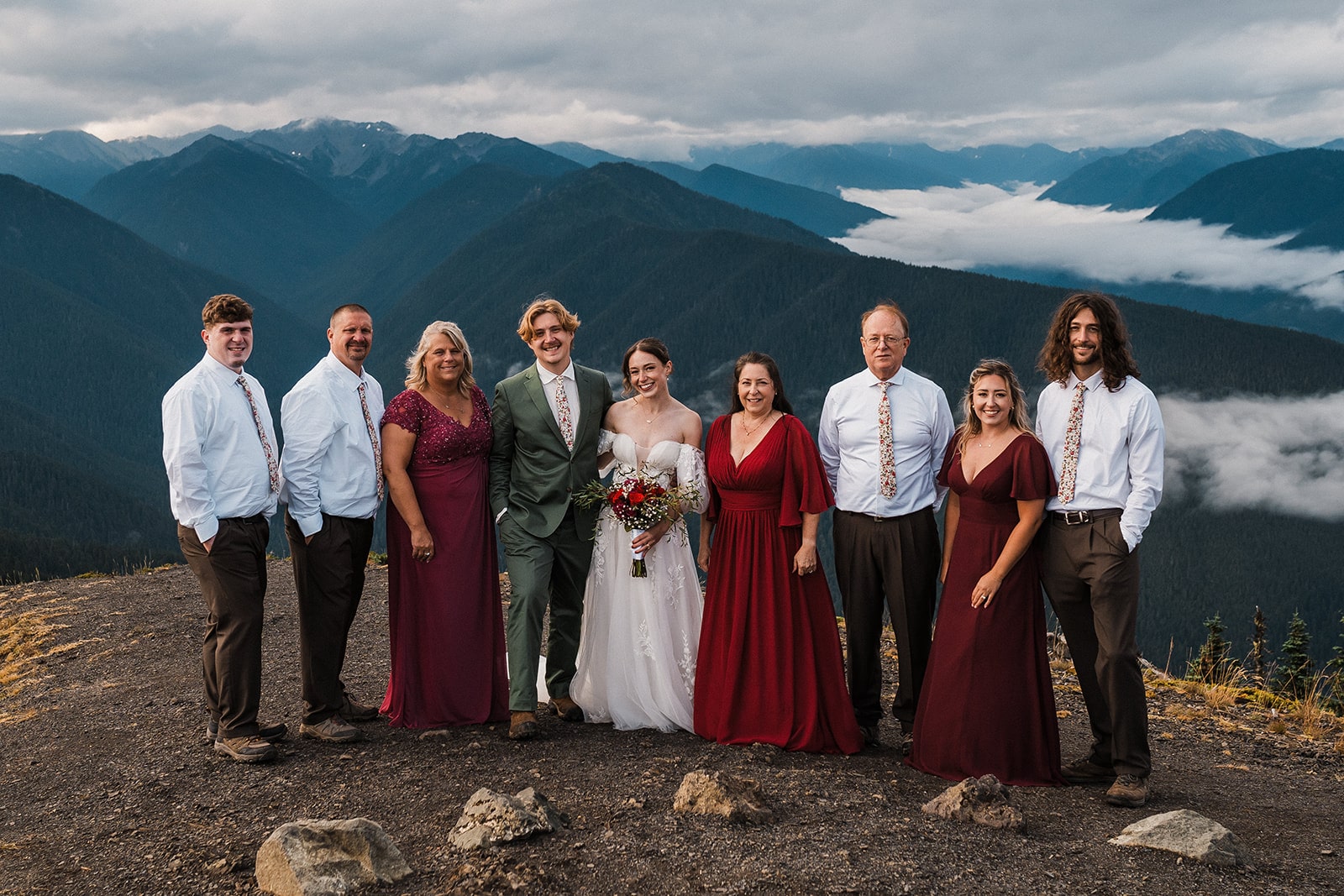 Family elopement portraits on the top of a mountain at Olympic National Park