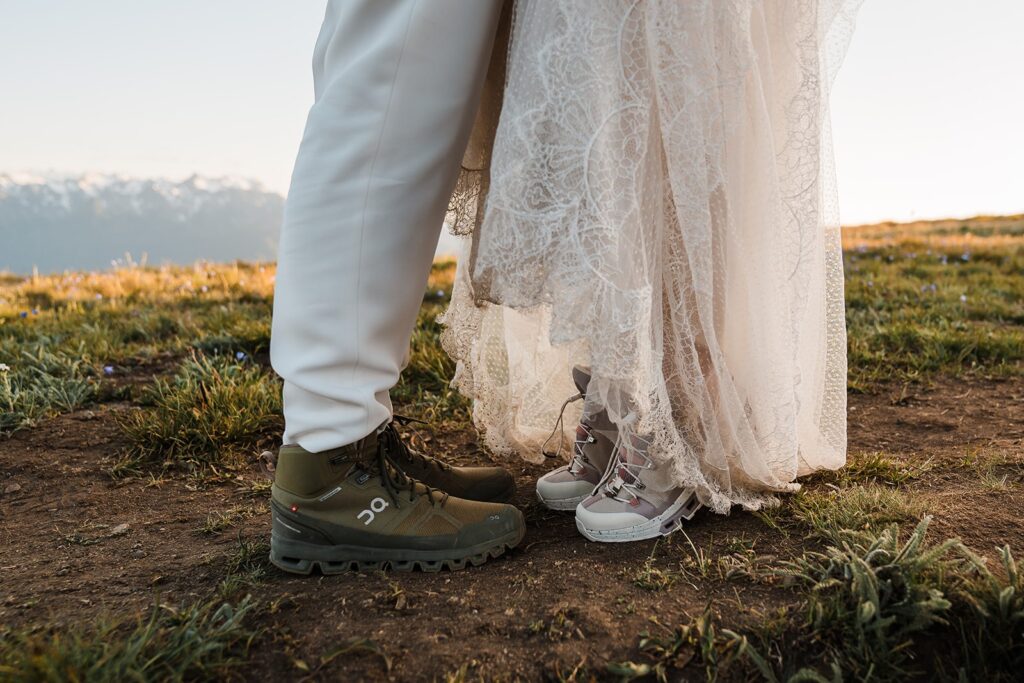 Bride and groom wear hiking boots during their adventure elopement 