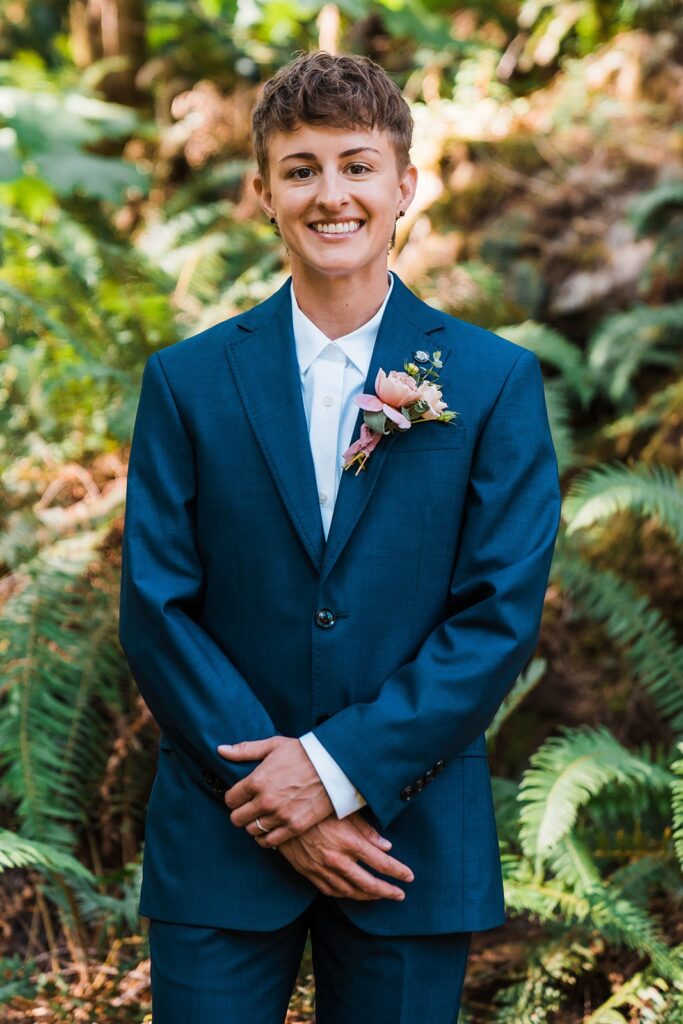 Bride wearing a blue custom suit during her adventure elopement 