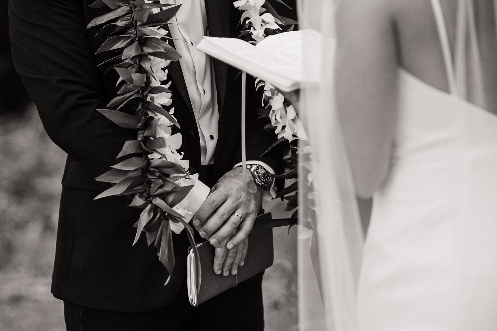 Bride and groom exchange personal vows during their Kauai wedding weekend.