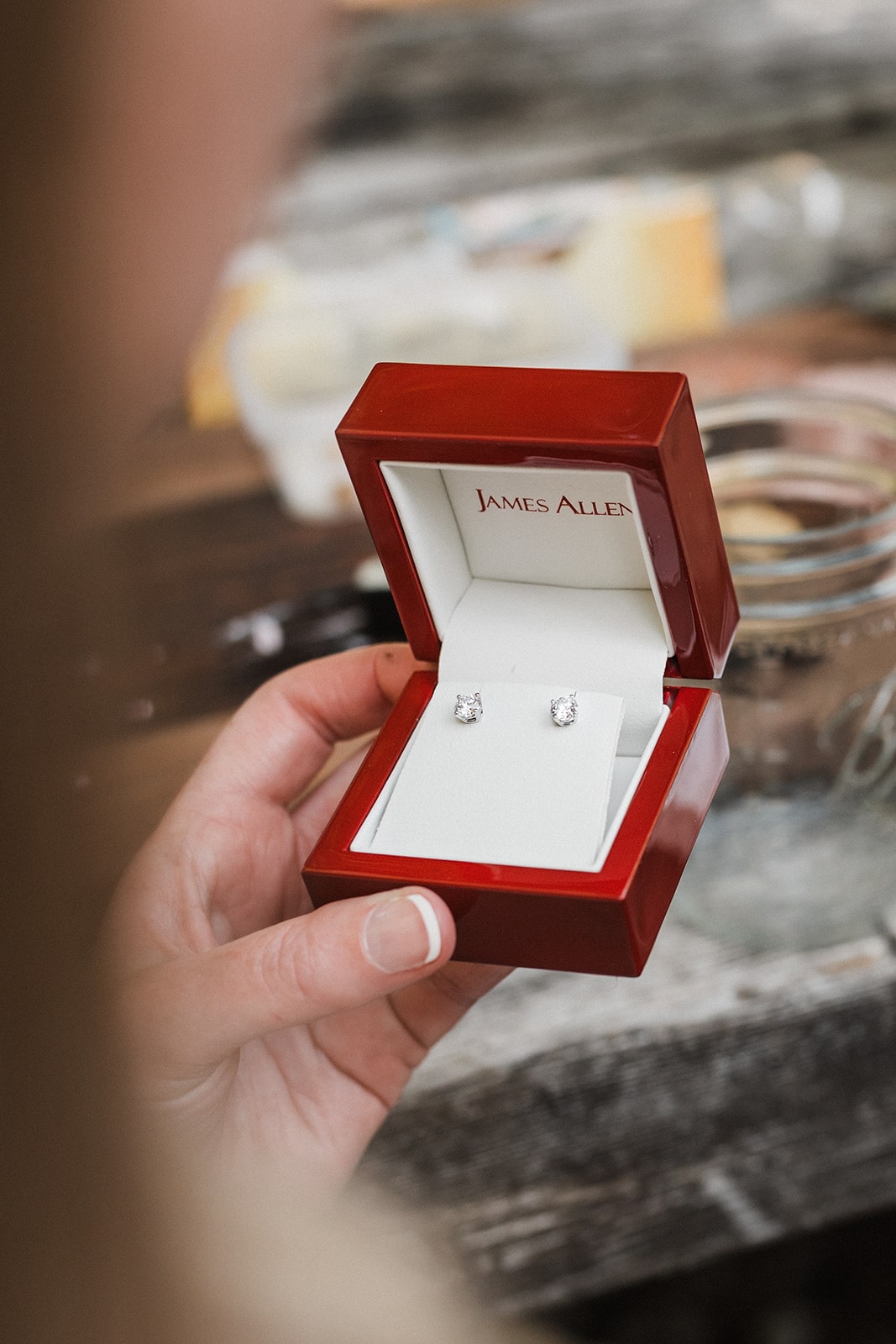 James Allen diamond stud earrings in red box. 
