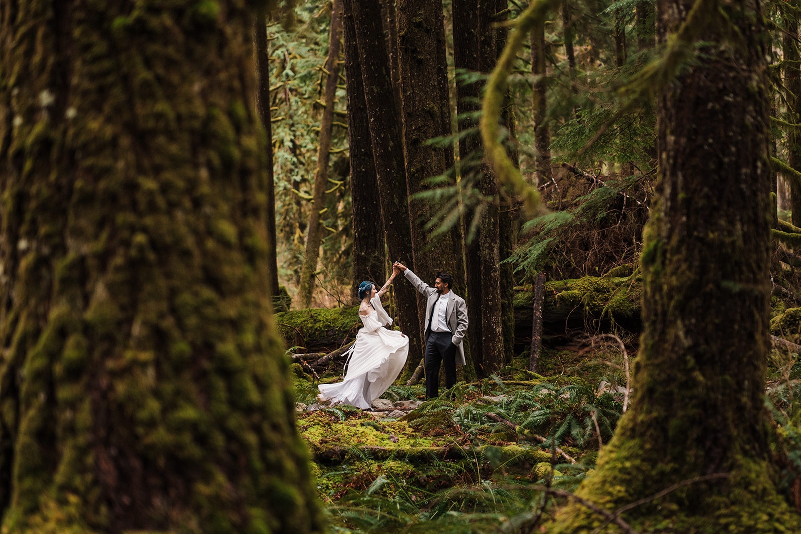 Bride and groom dance in the forest during their Snoqualmie elopement. 