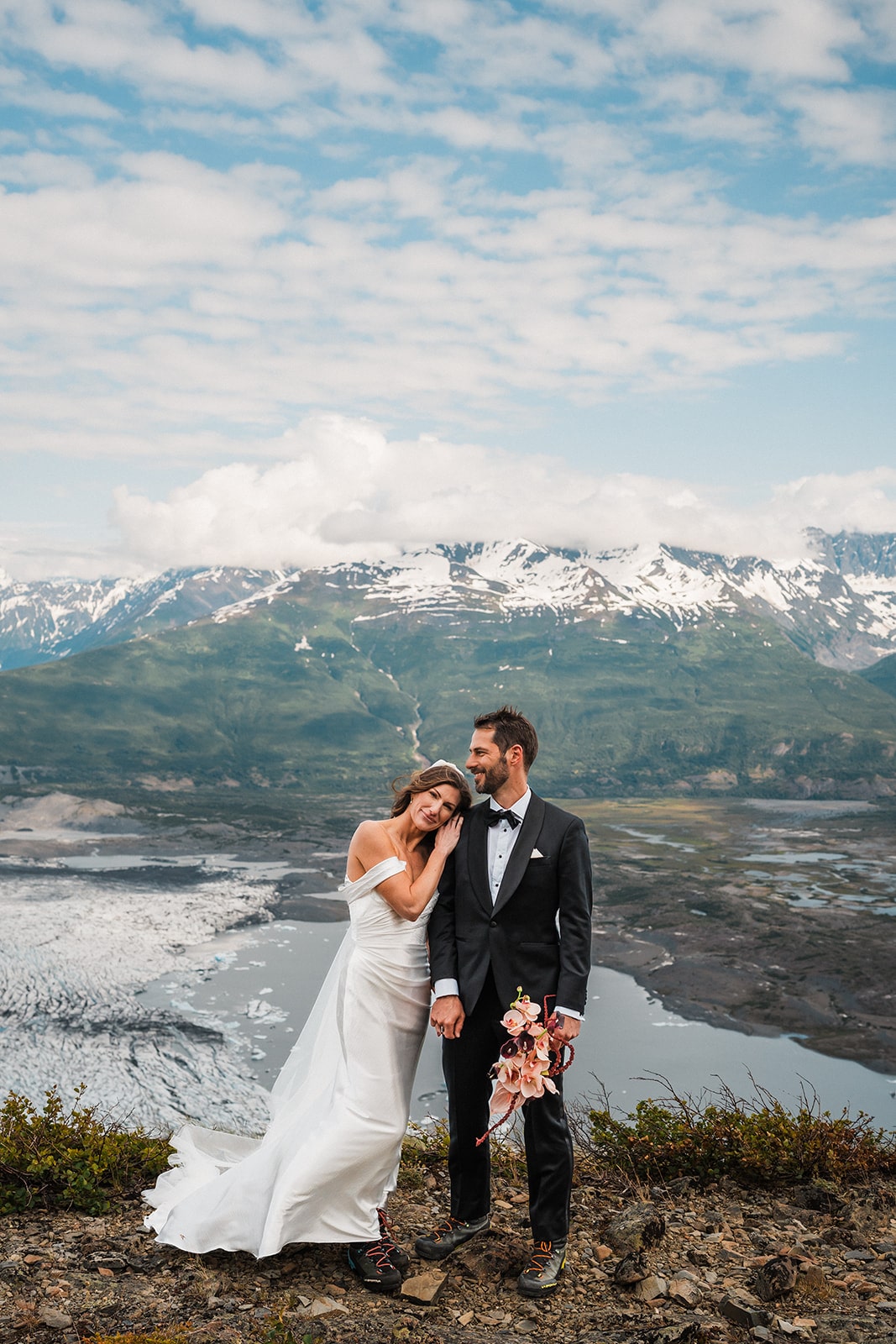 Bride leans her head on groom's shoulder during their Palmer, Alaska elopement.