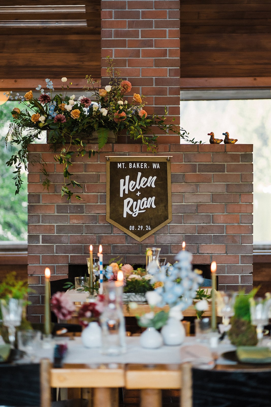 Wedding reception table decorations inside a state park wedding venue. 