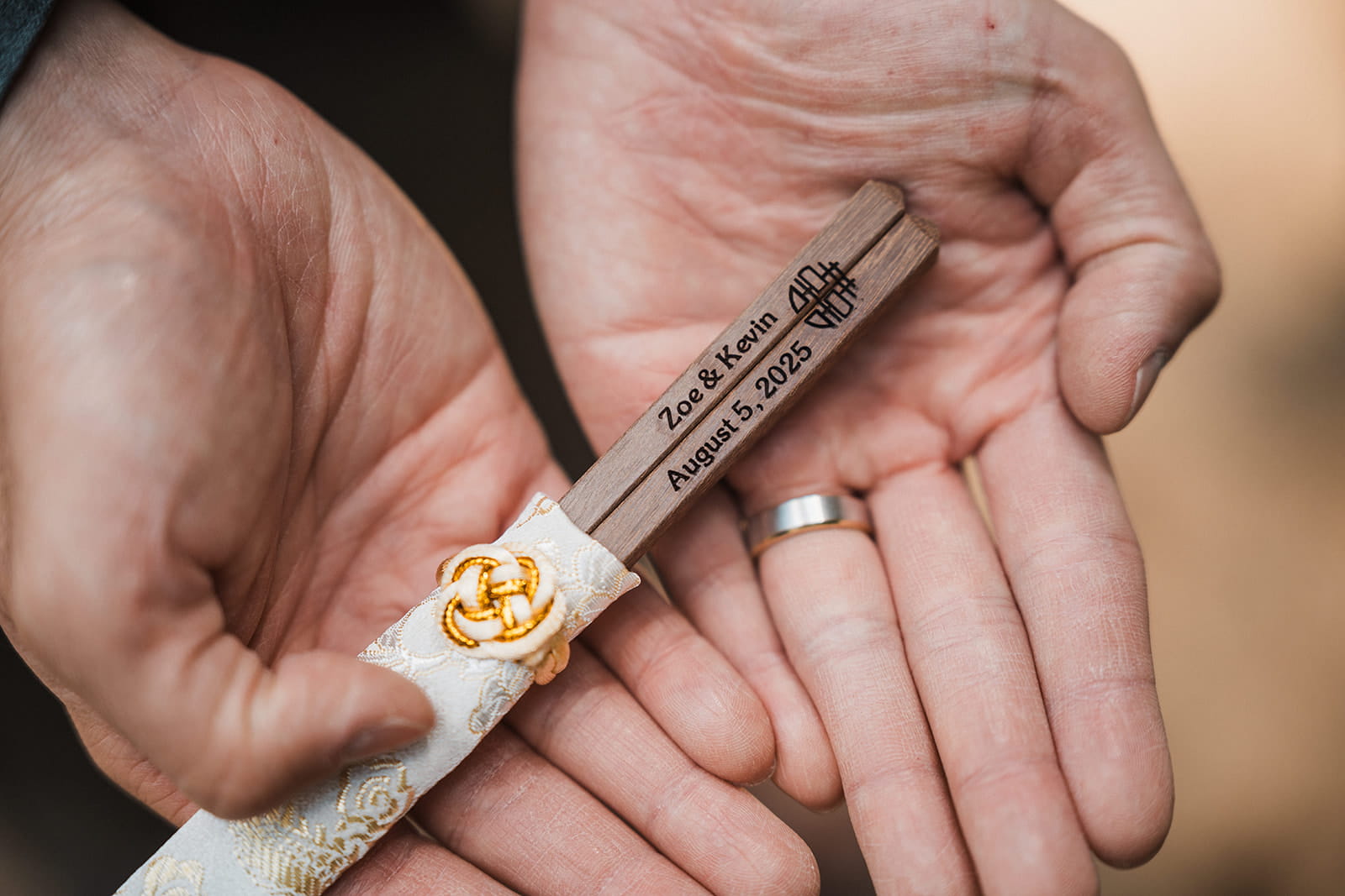 Custom chopsticks for a forest wedding reception dinner. 