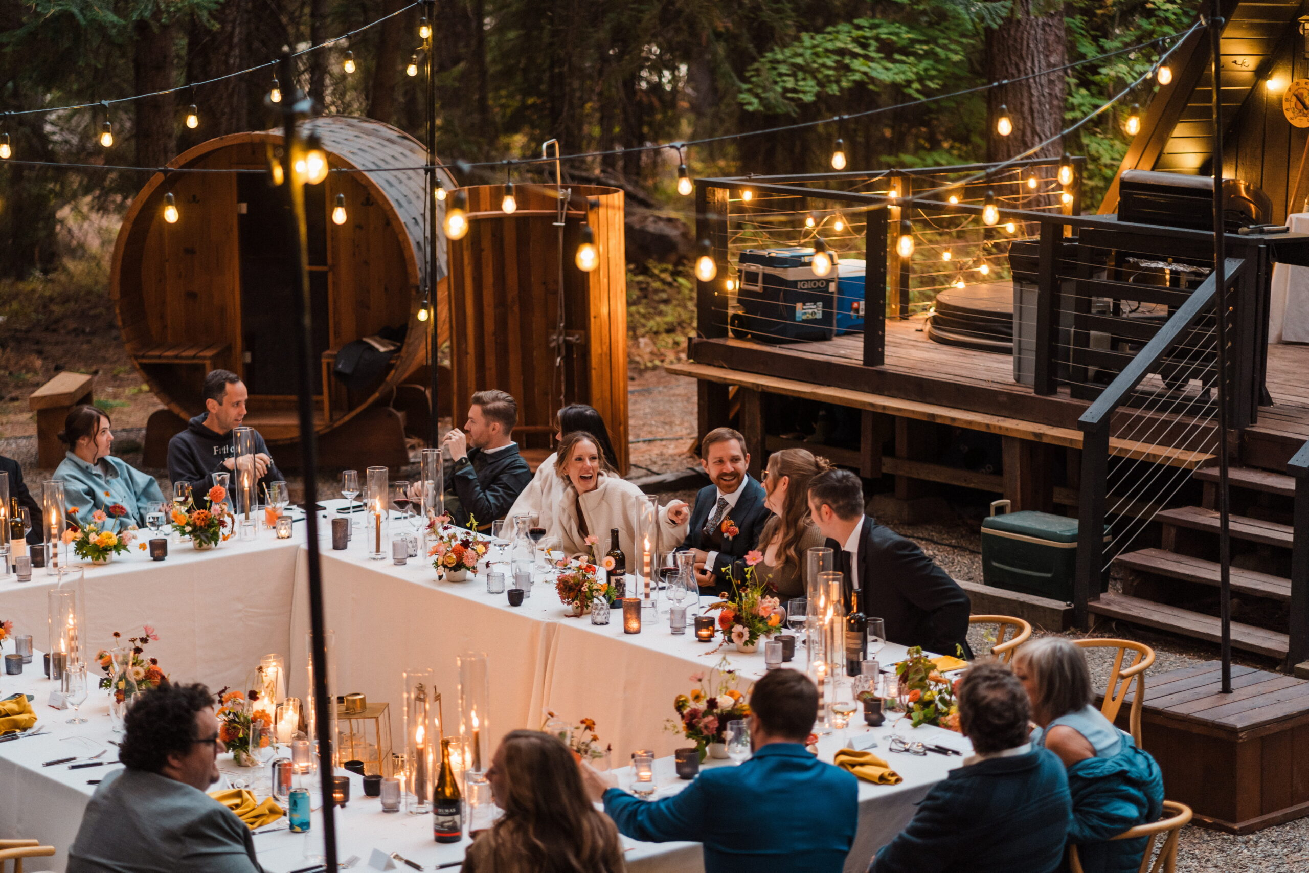 Newlyweds mingle with guests during their intimate wedding dinner in Snoqualmie. 