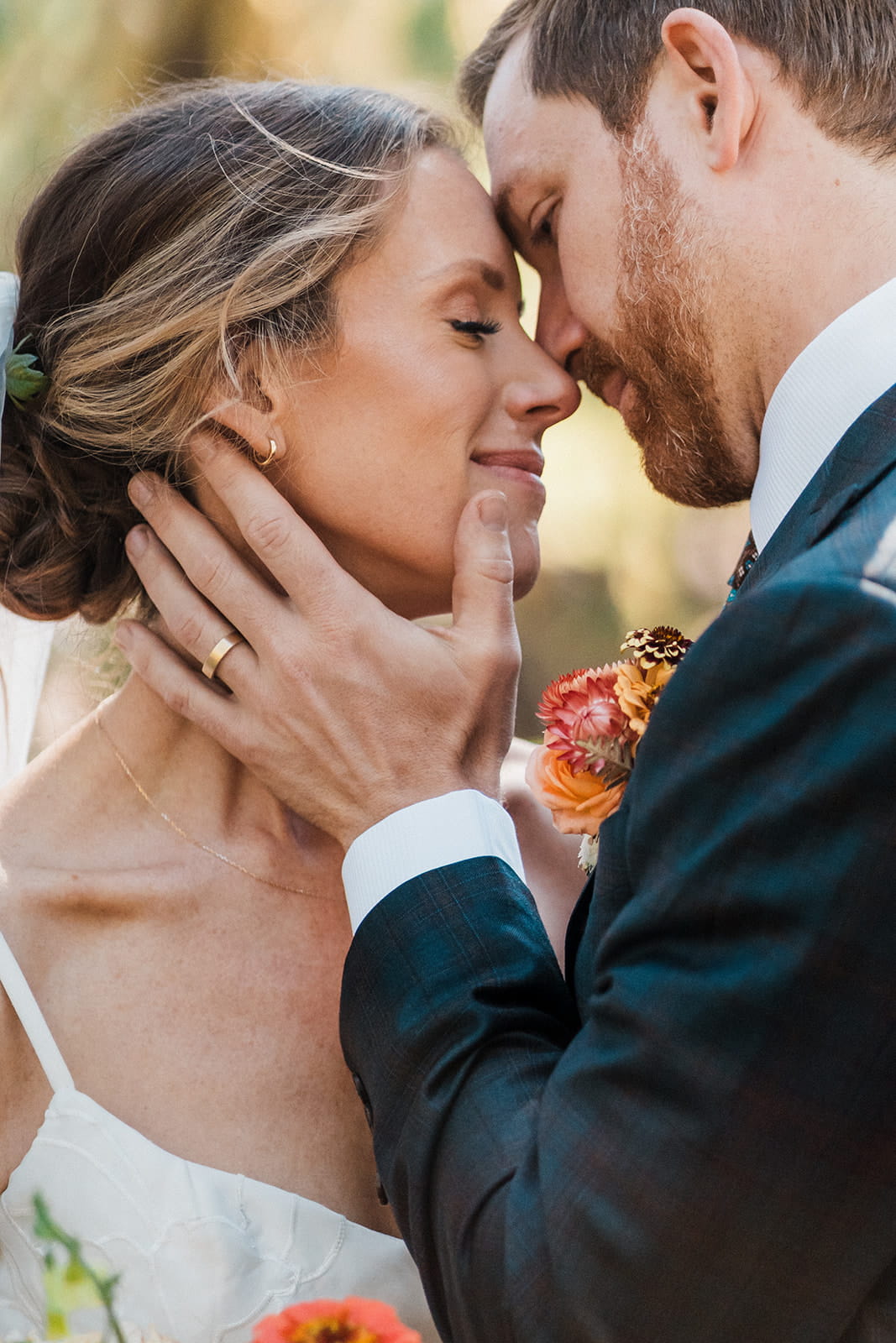 Couple embraces during their forest wedding photos in Washington. 