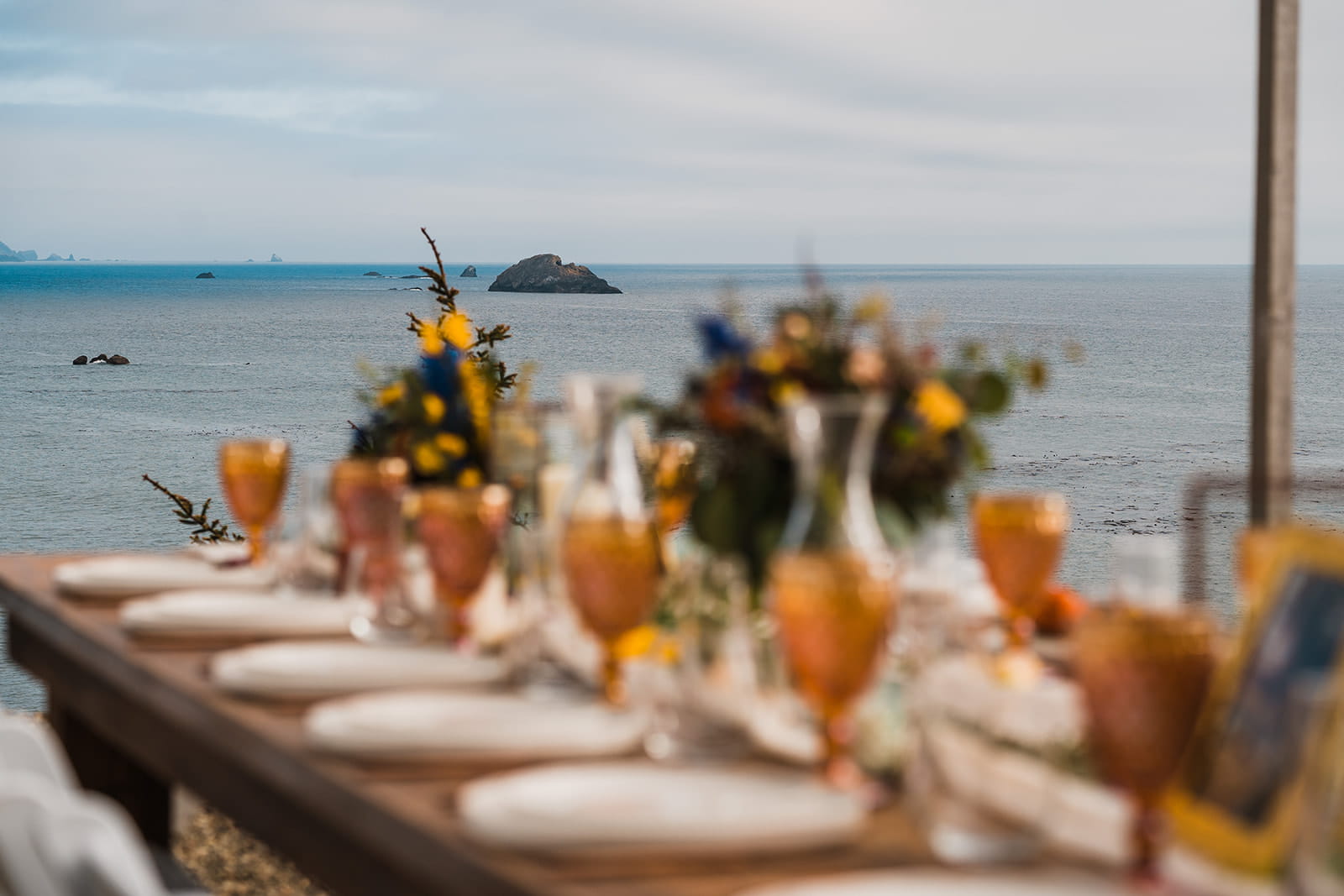 Micro wedding reception table overlooking the ocean at Crook Point wedding venue.